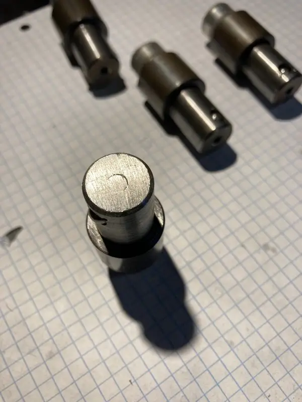Detail of a ball-lock clamping pin with a hand grip and side ball
