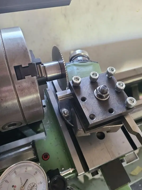 Cutting a profiled blank to length on the Emcomat with a thin slitting saw