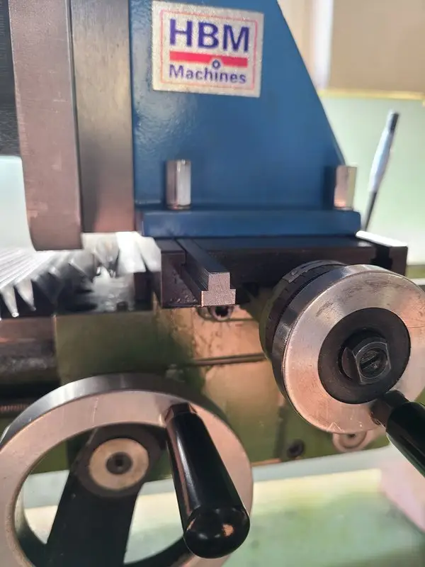T-nut in the slot, sitting slightly below the mounting surface